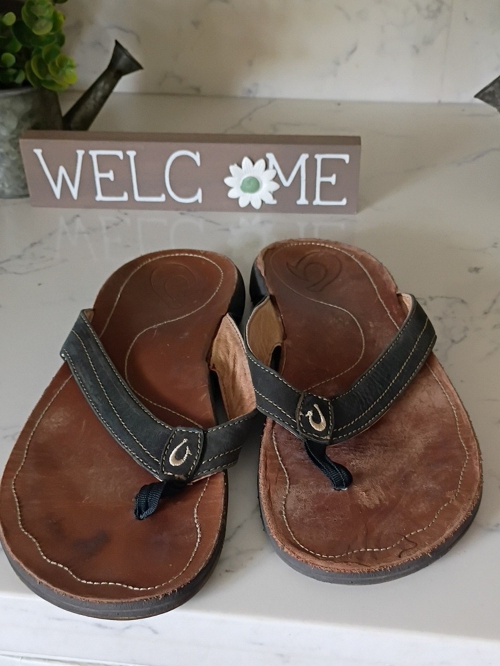 Olukai  Leather Flip Flop Sandals with Black Straps